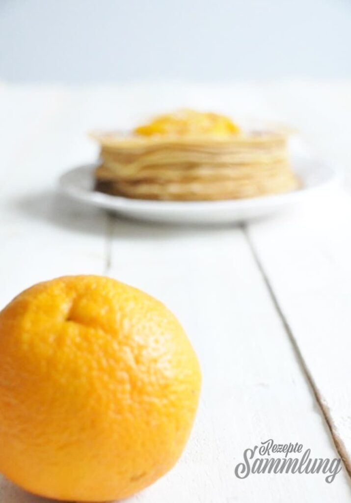 Rezept für Kokos-Zimt-Pfannkuchen mit Orangen